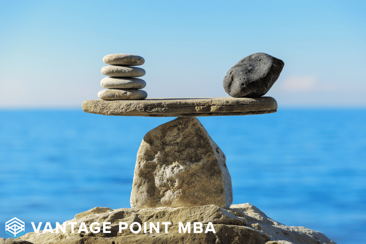 Image of rocks balancing on each other with an ocean view